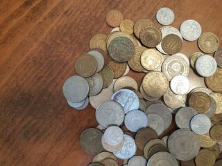 Pile of coins, gold silver and other types