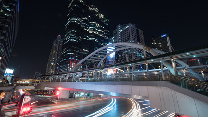 Road and pedestrian overpass in night Bangkok