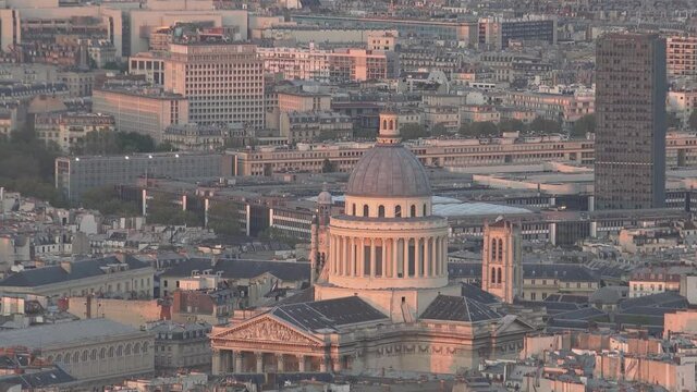 Aerial view over the city of Paris at dusk with the main attractions of the city center