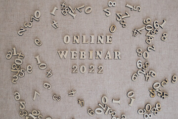 Wooden numbers 2022. Concept-online webinar, business, educational games for children and adults.