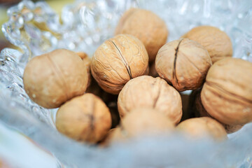 Walnut nuts in glass bowl