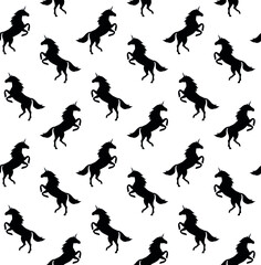 Vector seamless pattern of flat unicorn silhouette isolated on white background