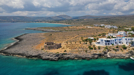 Fototapeta premium Aerial drone photo of iconic seaside traditional village and castle of Avlemonas, Kythira island, Ionian, Greece
