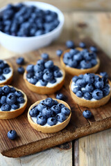 Blueberry tartlets. Delicious dessert with berries. Healthy snack.
