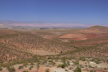 Africa Morocco desert Atlas mountains nature rock landscape with river palm under blue sky hot weather 
