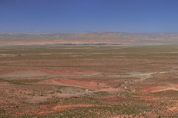 Africa Morocco desert Atlas mountains nature rock landscape with river palm under blue sky hot weather 