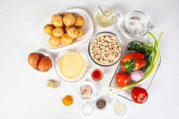 Ingredients to prepare the traditional patties from the region of Cauca in Colombia, called empanadas de pipián and the spice peanut sauce to accompany it