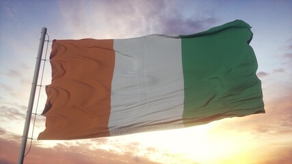 Flag of Cote d'ivoire waving in the wind, sky and sun background. 3d rendering