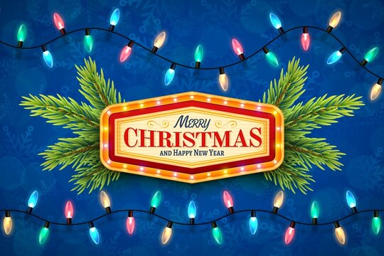 Merry Christmas and Happy New Year template. Vintage marquee sign with illuminated frame. Fir branches and different colored electric lights spaced evenly along a cable.