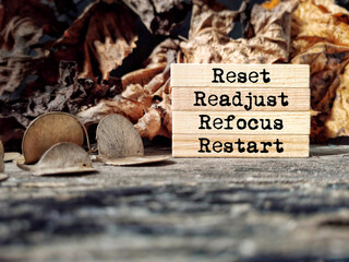 Inspirational and Motivational Concept - reset readjust refocus restart text background. Stock...