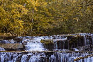 Autumn waterfall in the forest