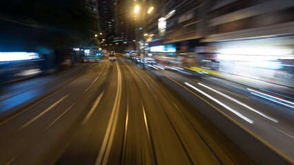 Fototapeta na wymiar View to night Hong Kong from moving double-decker tram