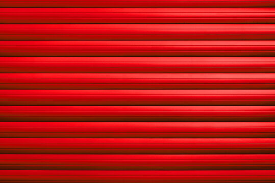 fond abstrait rouge de texture de volets roulant de porte de garage color&eacute;e