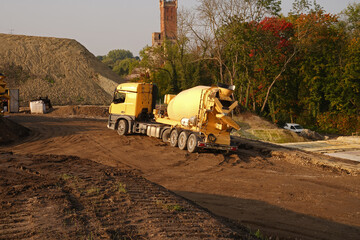 Concrete mixer truck in use at a construction site