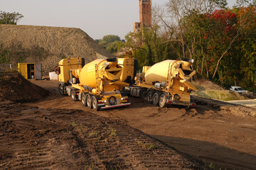 Concrete mixer truck in use at a construction site