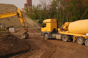Concrete mixer truck in use at a construction site