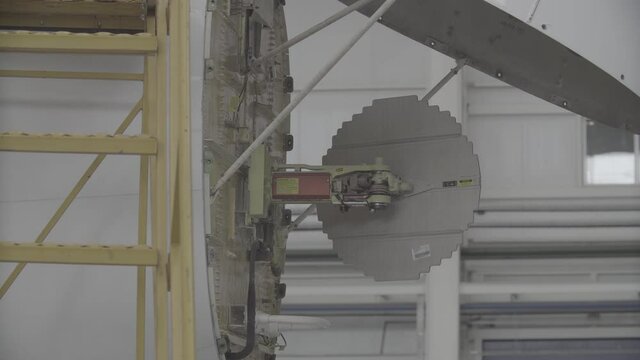 aircraft in the hangar being repaired