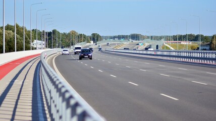 View on a concrete highway. Modern highway safety markings on concrete.