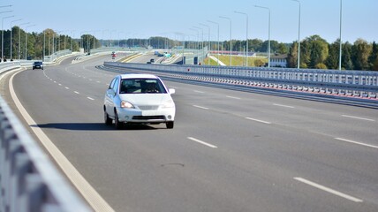 View on a concrete highway. Modern highway safety markings on concrete.