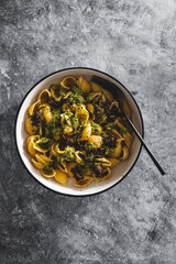 vegan homemde rustic pesto and aubergine shell pasta, healthy plant-based food