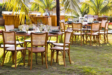 tables and chairs in restaurant, outdoor tables, garden tables, lawn tables, restaurant with outdoor seating, wooden furniture, wooden chairs, wooden tables