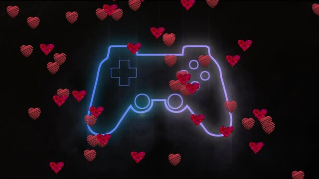 Animation of neon gamin pad and hearts floating on black background
