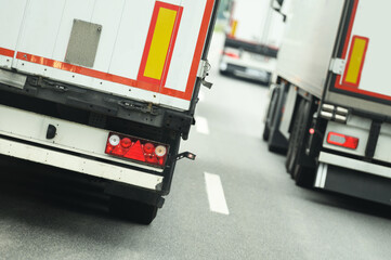 Semi Trucks Traffic. Commercial Vehicles Occupied All HIghway Lanes.