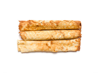 Dessert baked rolls with sweet filling. Confectionery on a white background. Studio photography