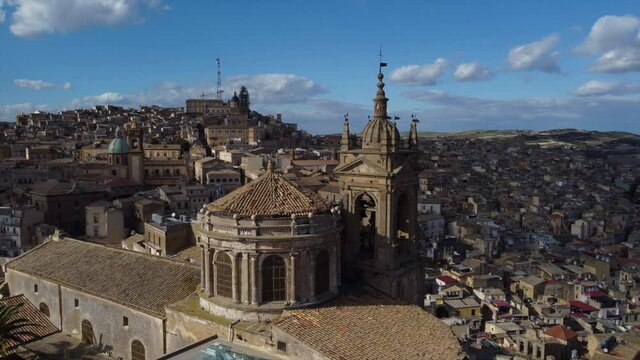 flying around church of famous Sicilian hill town of Caltagirone