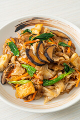 stir-fried noodles with tofu and vegetables