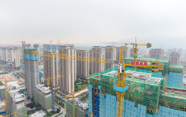 Fototapeta na wymiar Buildings under construction in China from drone viewpoint