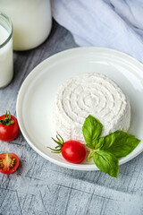 fresh ricotta with basil leaf and tomato
