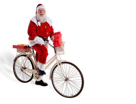 Santa Claus on bicycle delivering Christmas gifts.