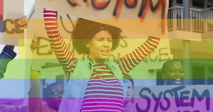 Animation of rainbow over diverse protesters with banners