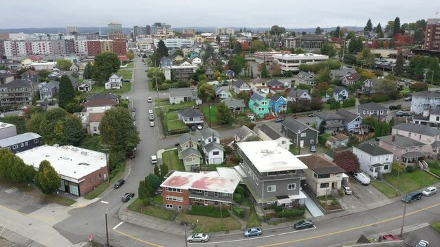 Cinematic 4K aerial drone clip of downtown Everett, Bayside, Port Gardner, Riverside, Naval Station Everett suburbs and bedroom communities North of Seattle on the shores of Puget Sound in Washington
