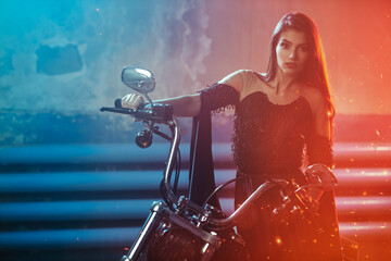 Fototapeta na wymiar elegant lady on motorbike