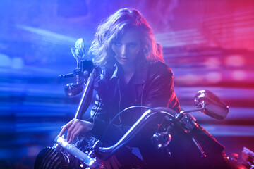 Fototapeta na wymiar girl riding a motorbike