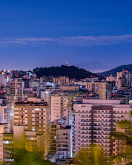 Naklejka premium Niterói, Rio de Janeiro, Brazil - CIRCA 2021: Long exposure urban night photography with buildings and lights of a Brazilian city