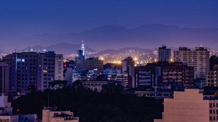 Fototapeta premium Niterói, Rio de Janeiro, Brazil - CIRCA 2021: Long exposure urban night photography with buildings and lights of a Brazilian city