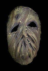 Burlap Stitched Scarecrow Mask Isolated Against Black Background