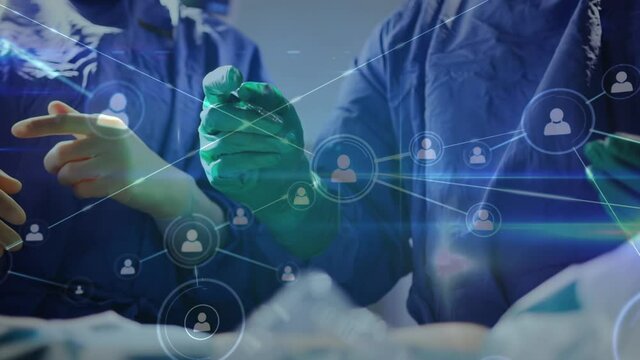 Animation of network of connections and icons over surgeons in operating theater