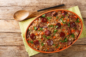 Authentic Arroz de pato duck rice is a traditional recipe from Portugal cooked with red wine,...