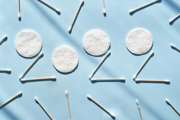 2022 numbers. Happy new Year sign. Start january idea. Creative postcard. Resolution concept. Modern twenty two design. Poster with text. Plan calendar top view. Ecology zero waste product. Cotton pad