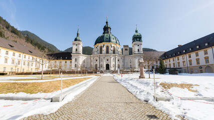 Front view of the Ettal Abbey basilica during winter.