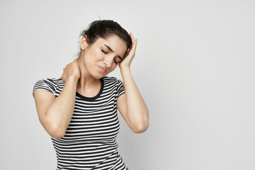 brunette holding his head migraine depression health problems