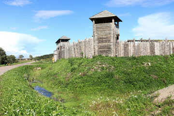 Landscape of wooden palisade with viking fortress towers