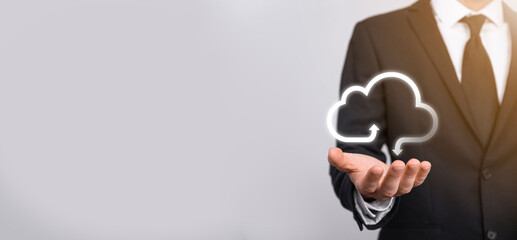 Business woman holding icon cloud computing network and icon connection data information in hand. Cloud computing and technology concept.