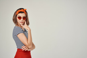 woman in striped t-shirt with bandage on her head wearing sunglasses fashion summer