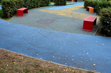 Skateboard, skating park for roller skating with a concrete cement surface painted blue and yellow....
