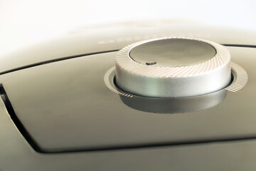 The power button on the vacuum cleaner